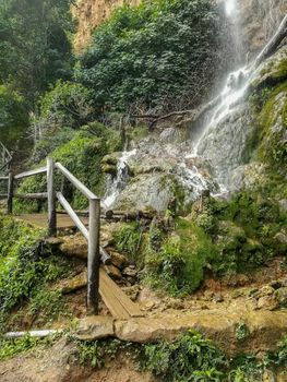 View of a waterfall in Navajas with wooden walkways