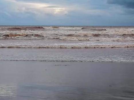 Beach of fine brown sand bathed by the waters of the Mediterranean Sea