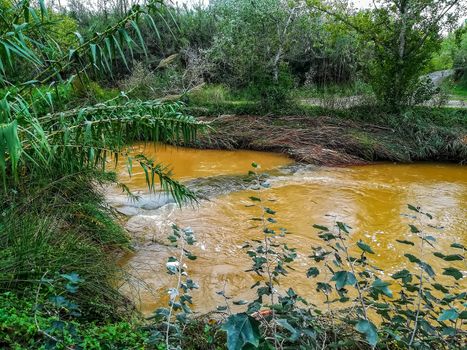 River of the natural setting of Clot with sediment laden water after heavy rains
