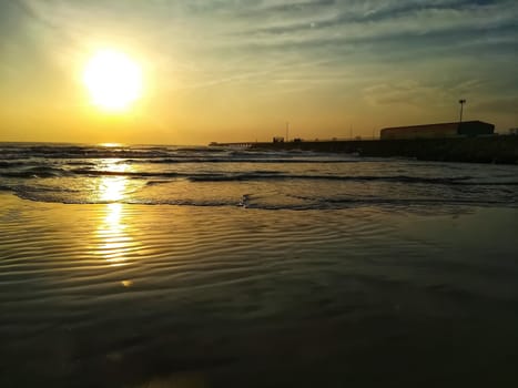 Beach of fine brown sand bathed by the waters of the Mediterranean Sea