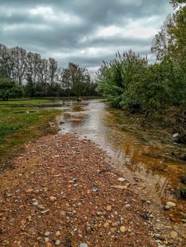 River of the natural setting of Clot with sediment laden water after heavy rains