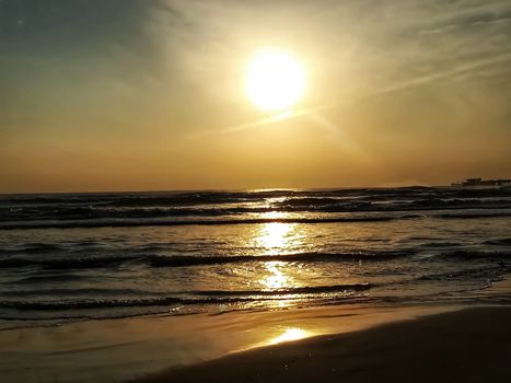 Beach of fine brown sand bathed by the waters of the Mediterranean Sea