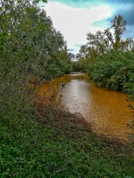 River of the natural setting of Clot with sediment laden water after heavy rains