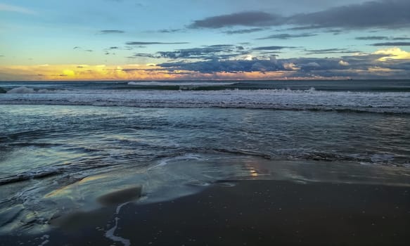 Beach of fine brown sand bathed by the waters of the Mediterranean Sea