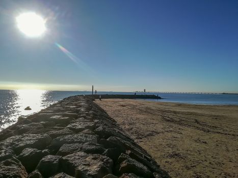 Beach of fine brown sand bathed by the waters of the Mediterranean Sea