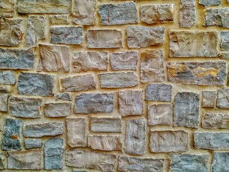 Facade view of stones in pastel colors