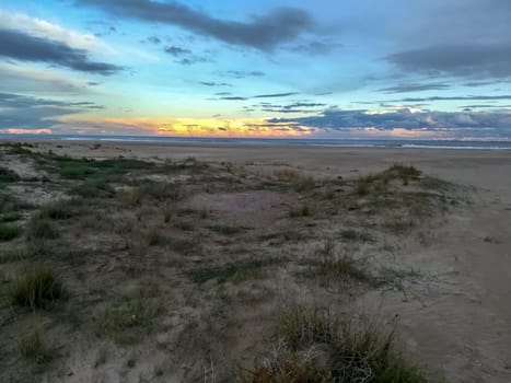 Beach of fine brown sand bathed by the waters of the Mediterranean Sea