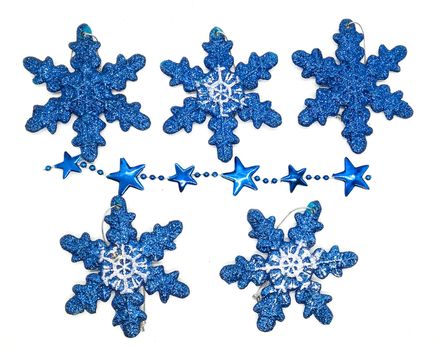 Blue christmas decorations in composition on white background