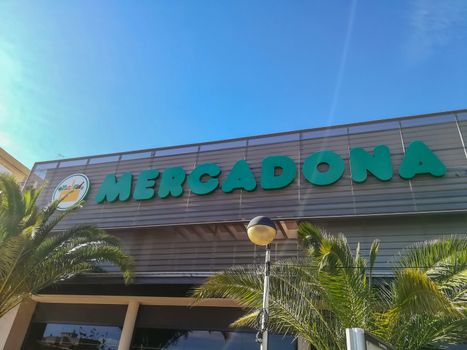 Puzol, Spain 11/07/18: Mercadona poster with blue sky