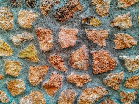 Facade view of stones in pastel colors