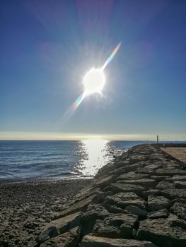 Beach of fine brown sand bathed by the waters of the Mediterranean Sea