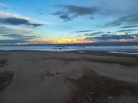 Beach of fine brown sand bathed by the waters of the Mediterranean Sea