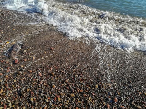 Small stone beach bathed by the waters of the Mediterranean Sea