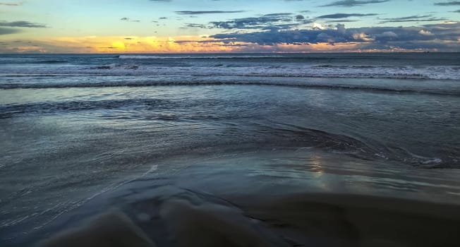 Beach of fine brown sand bathed by the waters of the Mediterranean Sea