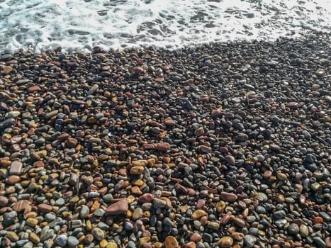Small stone beach bathed by the waters of the Mediterranean Sea