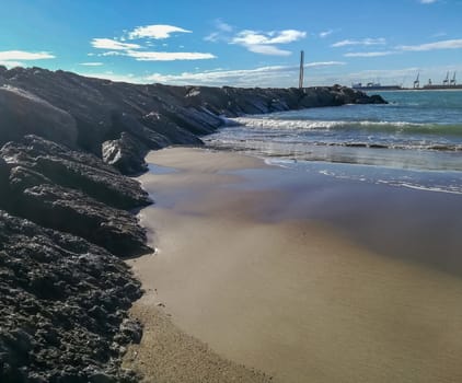 Breakwater on the beach in the Port of Sagunto