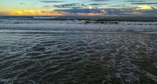 Beach of fine brown sand bathed by the waters of the Mediterranean Sea