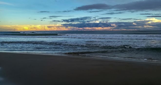 Beach of fine brown sand bathed by the waters of the Mediterranean Sea