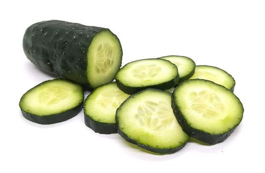 Sliced vegetables in composition on white background