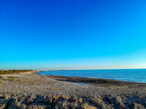 Small stone beach bathed by the waters of the Mediterranean Sea