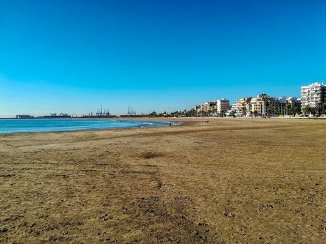 Beach of fine brown sand bathed by the waters of the Mediterranean Sea