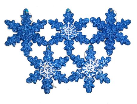 Blue christmas decorations in composition on white background