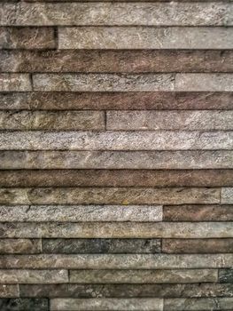 Stone background formed by thin lines in gray tones