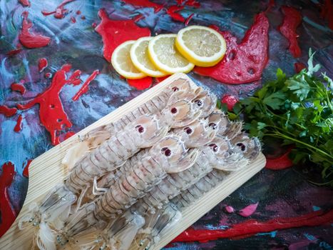 Seafood in composition on colorful and rough background
