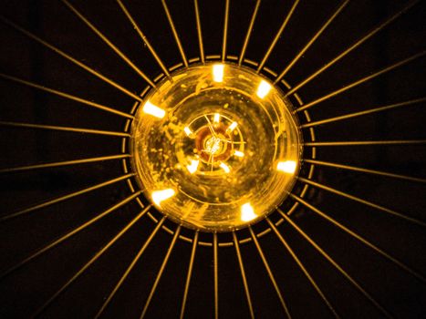View from below of a bulb on a black background