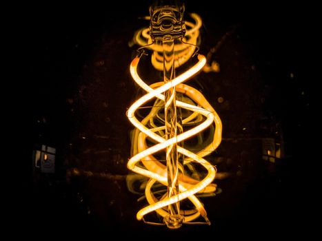 View from below of a bulb on a black background