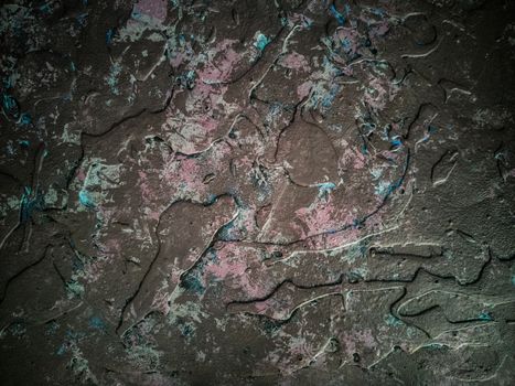 Background in dark tones with relief and rough texture