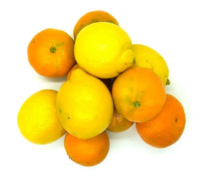 Orange and lemons in composition on white background