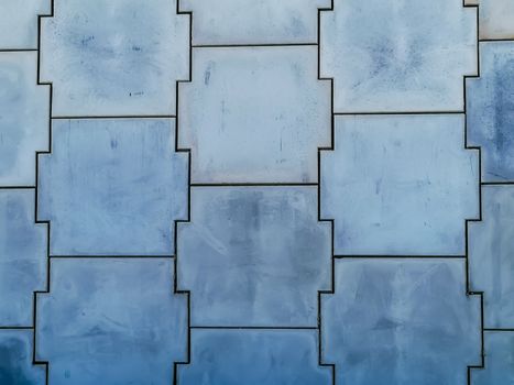 Regular panels in blue tones in composition