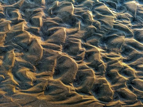 Curios formation made by water in the sand of Burriana beach