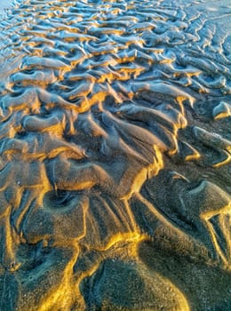 Curios formation made by water in the sand of Burriana beach