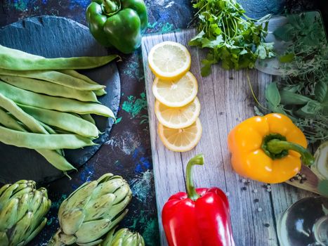 Orchard vegetables in composition on dark and rough background