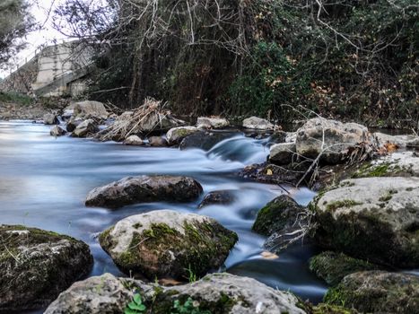 Palancia river waters flowing through the rocks in long exposure