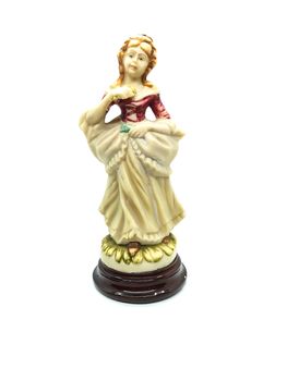 Ceramic figures of people on white background