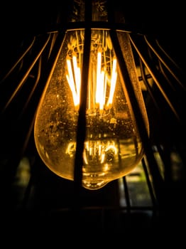 View from below of a bulb on a black background