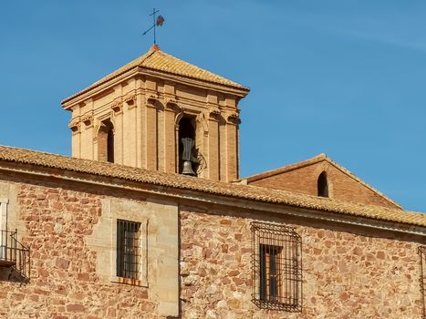 Bell tower of the monastery with blue sky