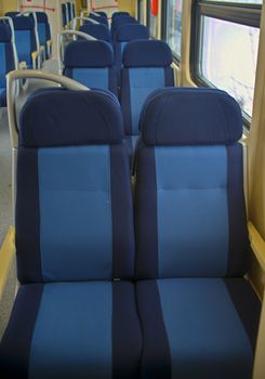 Row of empty seats in train wagon