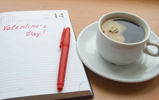 The concept of celebrating Valentine's Day, Cup of coffee, diaries