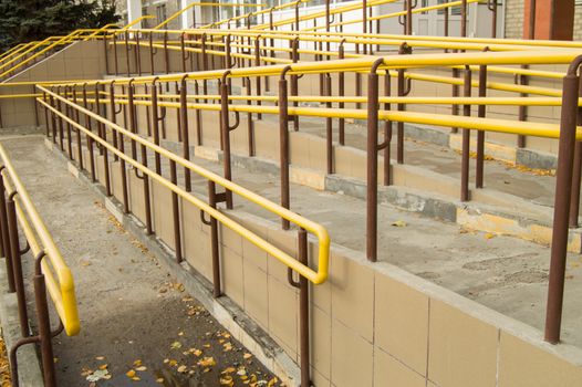 Ramp way for the movement of wheelchair users at the entrance to the building.