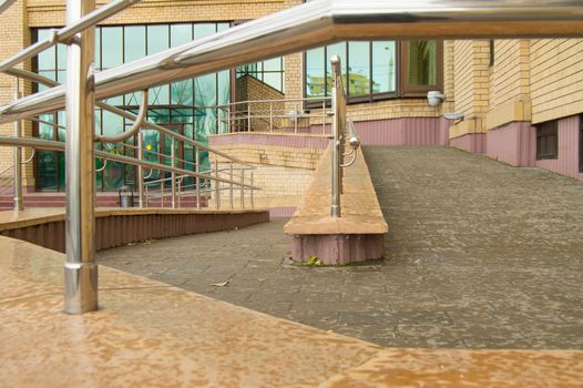 Ramp way for the movement of wheelchair users at the entrance to the building.