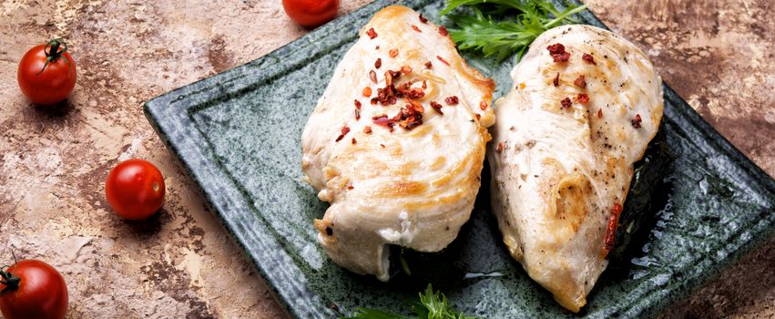 Roasted chicken breasts stuffed with green.Healthy dinner
