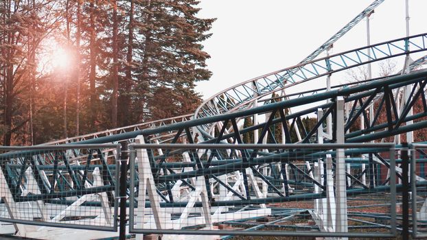 A Colorful Looping Roller Coaster On A Beautiful Sunny Day