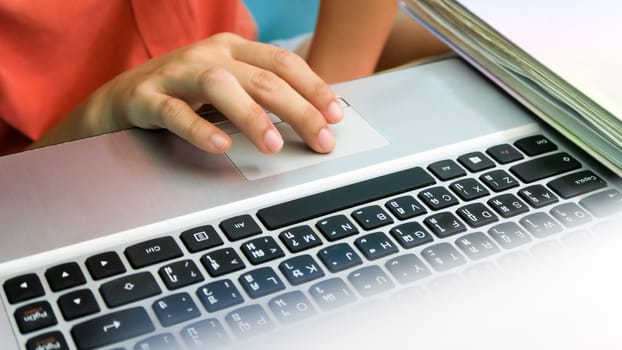 Woman using a labtop computer background