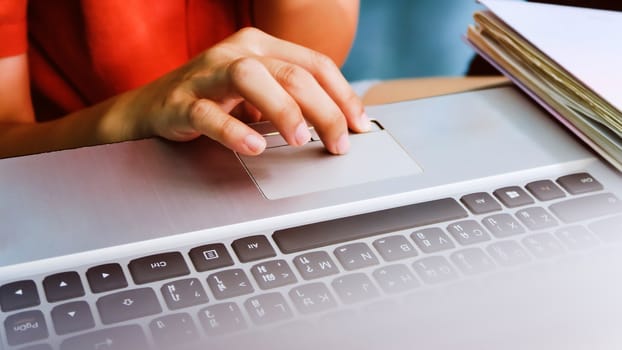Woman using a labtop computer background