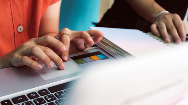 Woman using a labtop computer background