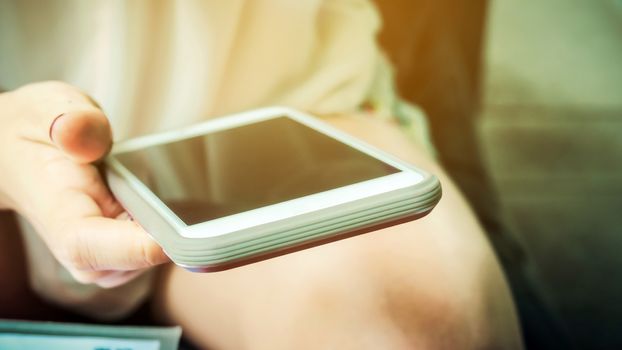 Close up image of Woman Using a Smart Phone